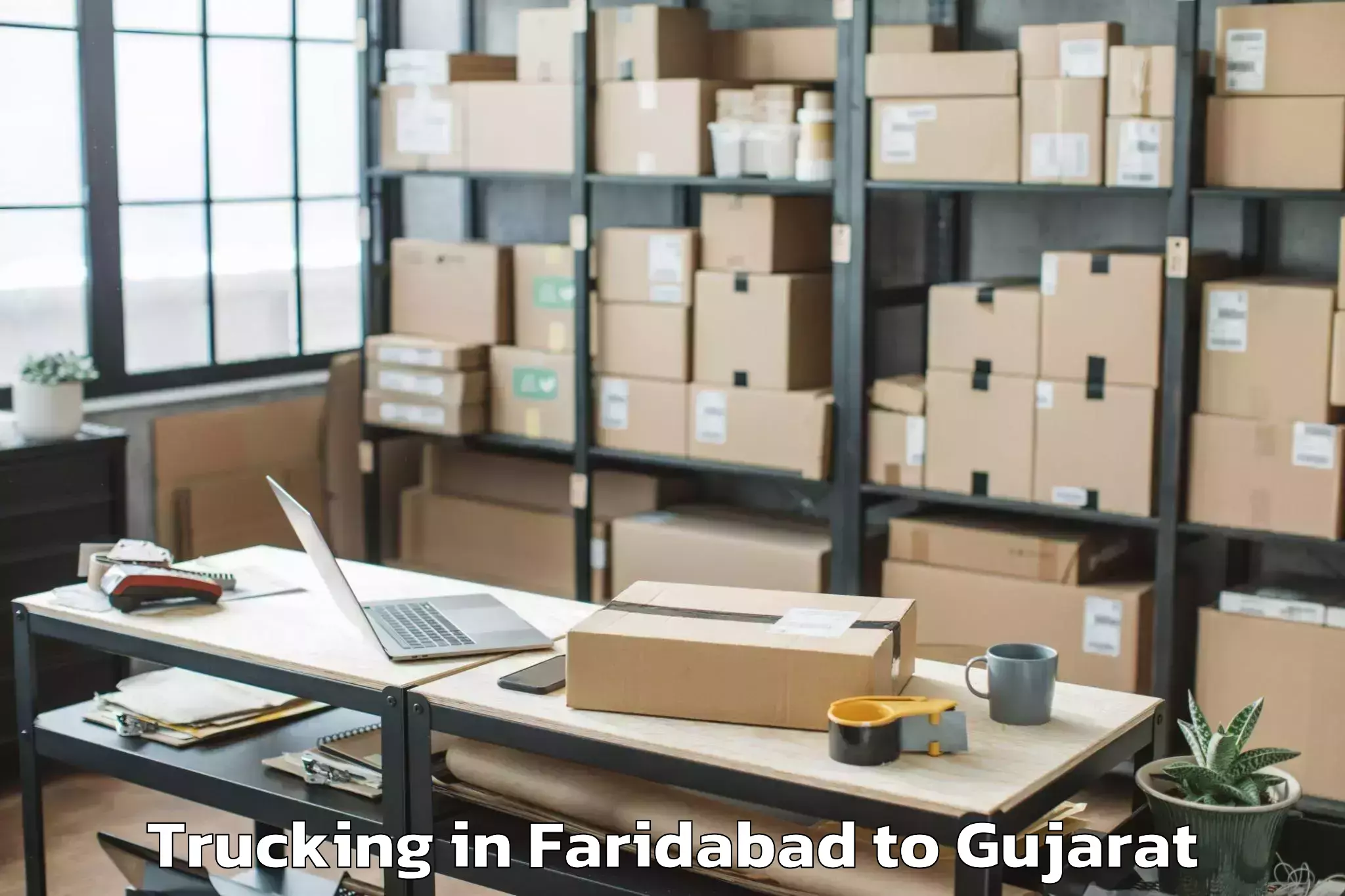 Easy Faridabad to Bhilad Trucking Booking